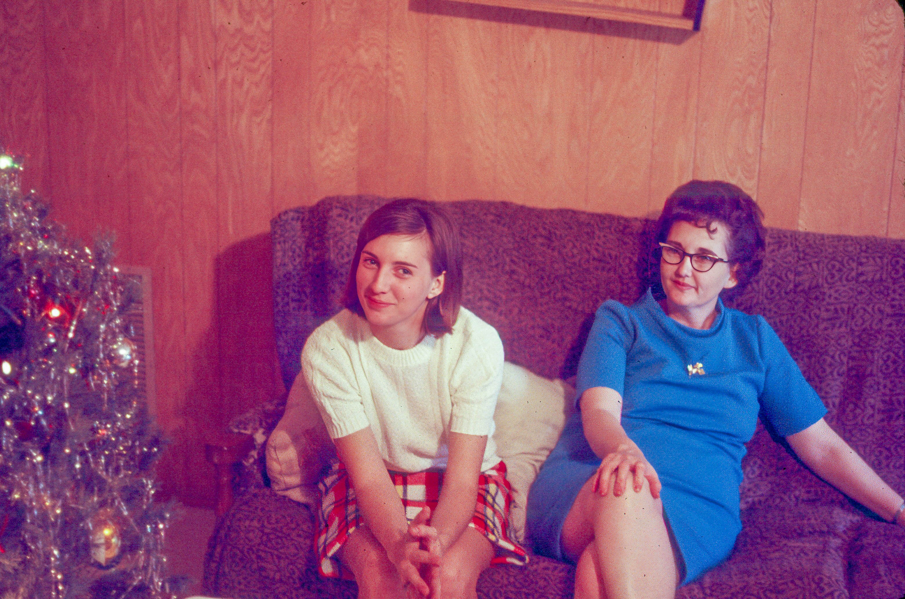 Linda and Helen ou my folks sofa at Christmas mid 70s.