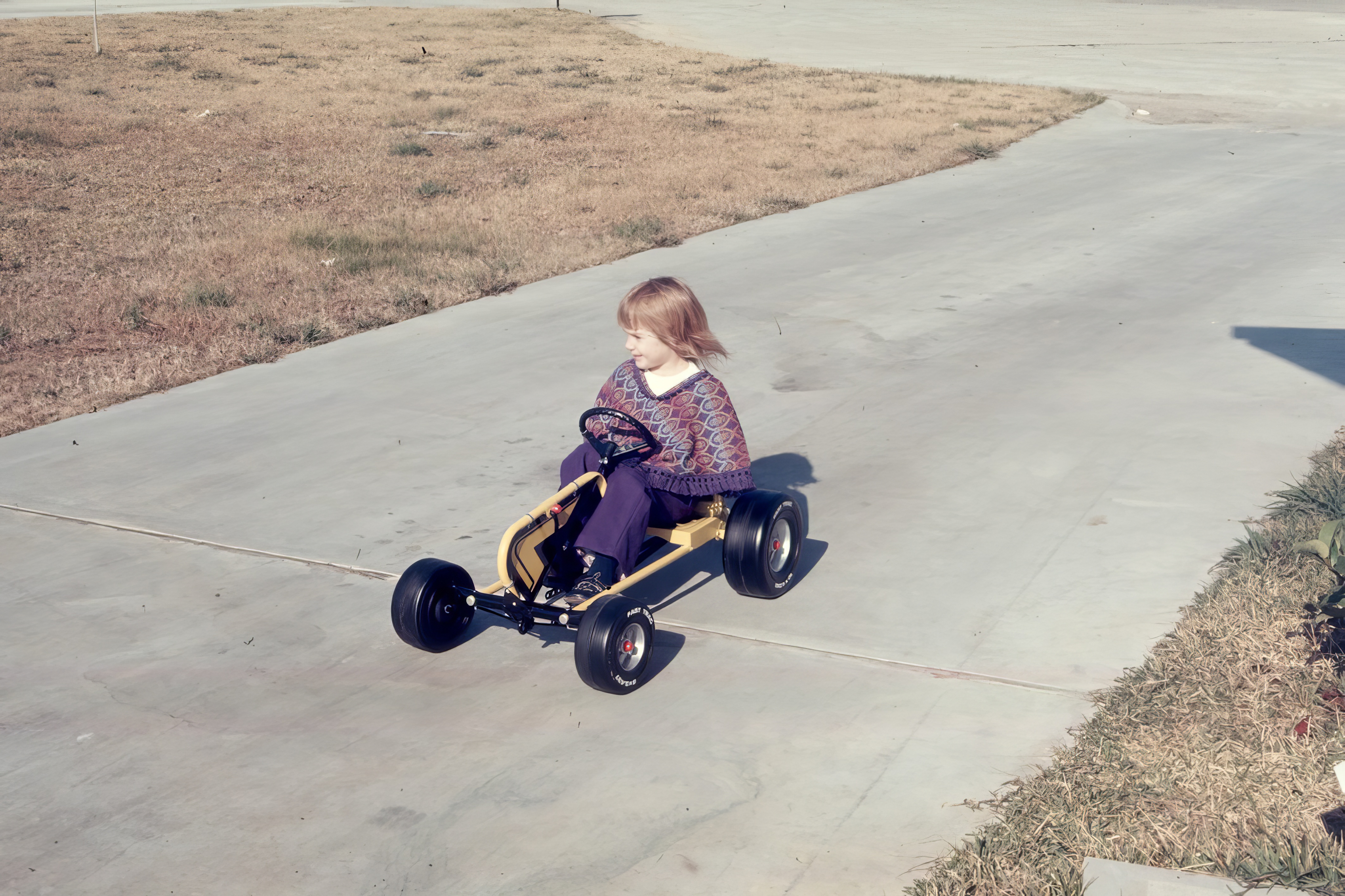 Britany with the pedal car